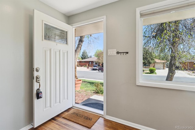 269 Beryl Way, Broomfield, CO 80020 - entrance foyer with baseboards and wood finished floors