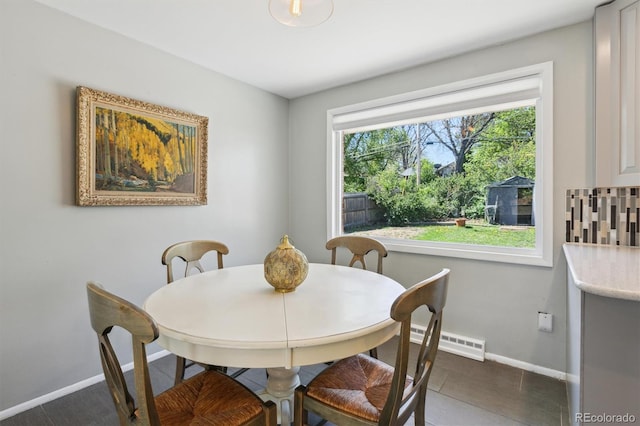 269 Beryl Way, Broomfield, CO 80020 - dining room featuring a baseboard radiator and baseboards