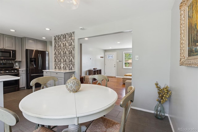 269 Beryl Way, Broomfield, CO 80020 - tiled dining area with baseboards and recessed lighting