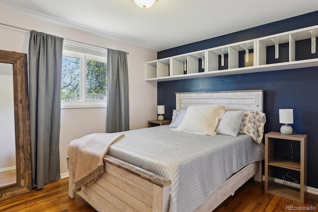 269 Beryl Way, Broomfield, CO 80020 - bedroom featuring wood finished floors and baseboards