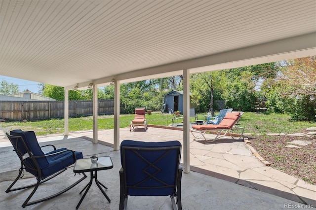269 Beryl Way, Broomfield, CO 80020 - view of patio with a storage unit, an outdoor structure, and a fenced backyard