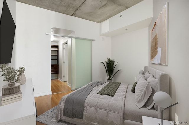 bedroom featuring light hardwood / wood-style flooring