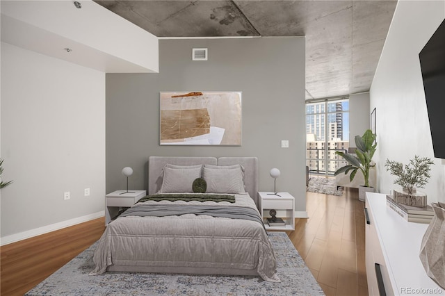 bedroom featuring wood-type flooring