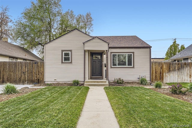 4425 S Lincoln St, Englewood, CO 80113 - bungalow-style home featuring fence and a front yard