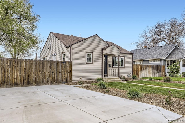 4425 S Lincoln St, Englewood, CO 80113 - bungalow-style house featuring a shingled roof and fence
