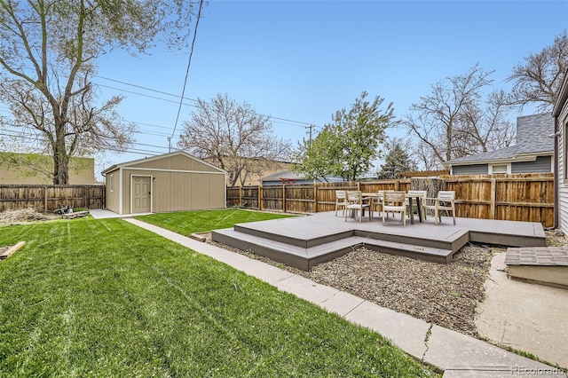 4425 S Lincoln St, Englewood, CO 80113 - view of yard with a fenced backyard, an outbuilding, a deck, and outdoor dining space