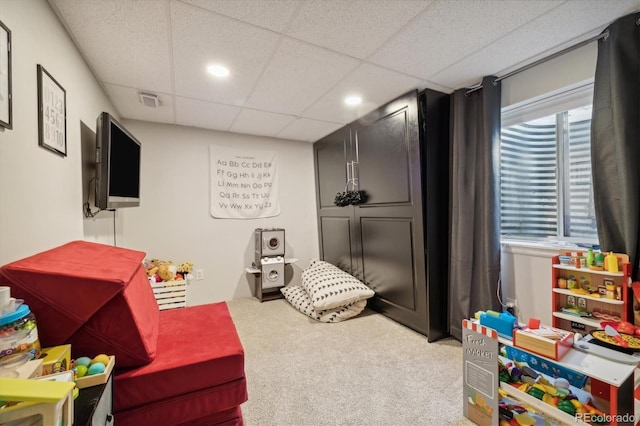 rec room with carpet floors, a drop ceiling, visible vents, and recessed lighting