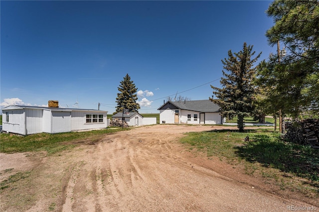 9940 N Calhan Hwy, Calhan, CO 80808 - view of front of home with a chimney