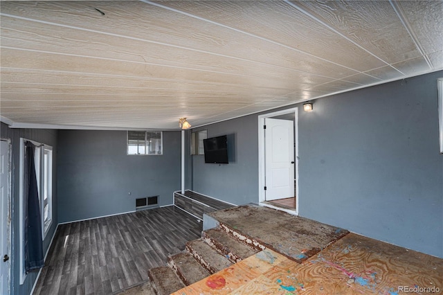 9940 N Calhan Hwy, Calhan, CO 80808 - unfurnished room with wood finished floors, stairs, and wooden ceiling
