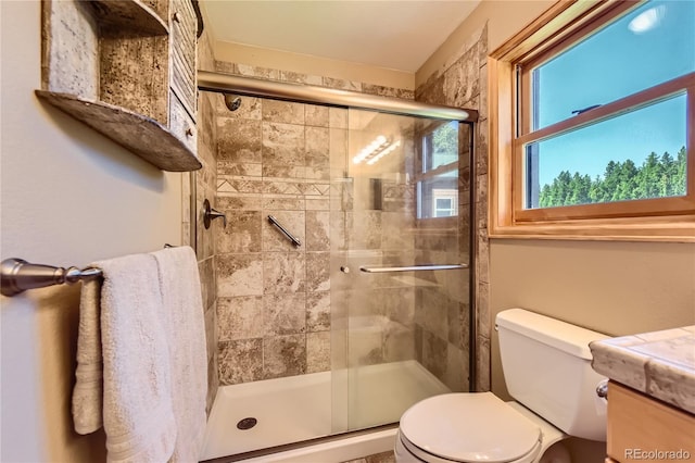 10450 Hondah Dr, Littleton, CO 80127 - full bath with toilet, a stall shower, and vanity