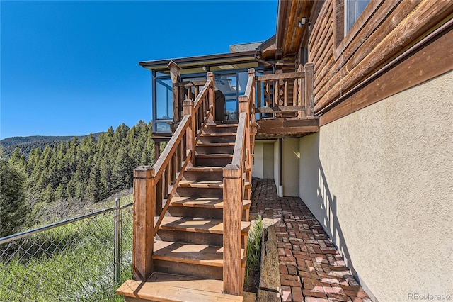 10450 Hondah Dr, Littleton, CO 80127 - stairs with a forest view