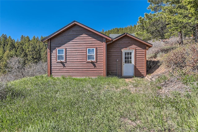 10450 Hondah Dr, Littleton, CO 80127 - rear view of house with a yard