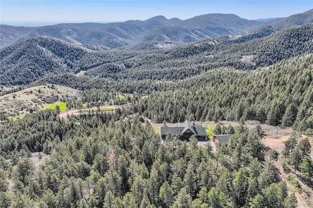 10450 Hondah Dr, Littleton, CO 80127 - view of mountain background with a forest