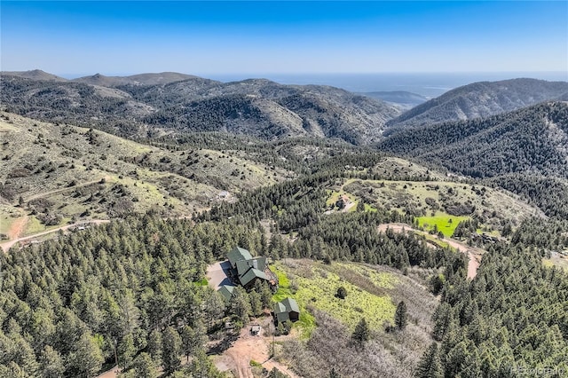 10450 Hondah Dr, Littleton, CO 80127 - view of mountain backdrop featuring a forest