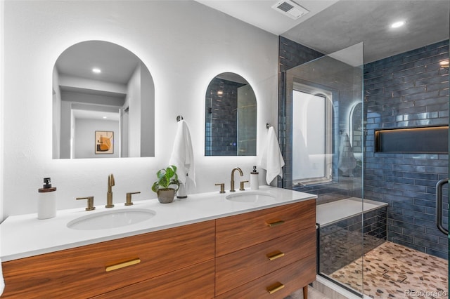 1220 Ash St, Denver, CO 80220 - bathroom with a sink, double vanity, a shower stall, and visible vents