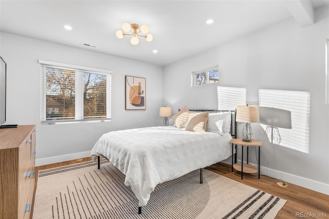1220 Ash St, Denver, CO 80220 - bedroom with baseboards, recessed lighting, visible vents, and wood finished floors
