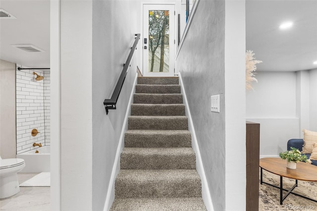 1220 Ash St, Denver, CO 80220 - staircase featuring baseboards and visible vents