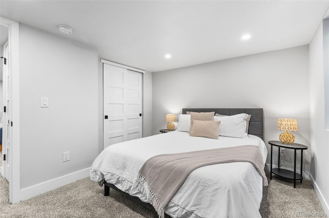 1220 Ash St, Denver, CO 80220 - bedroom with baseboards, carpet flooring, and a closet