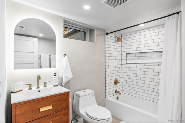 1220 Ash St, Denver, CO 80220 - bathroom with shower / tub combo, toilet, visible vents, and vanity