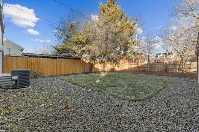 1220 Ash St, Denver, CO 80220 - view of yard with central AC unit and a fenced backyard