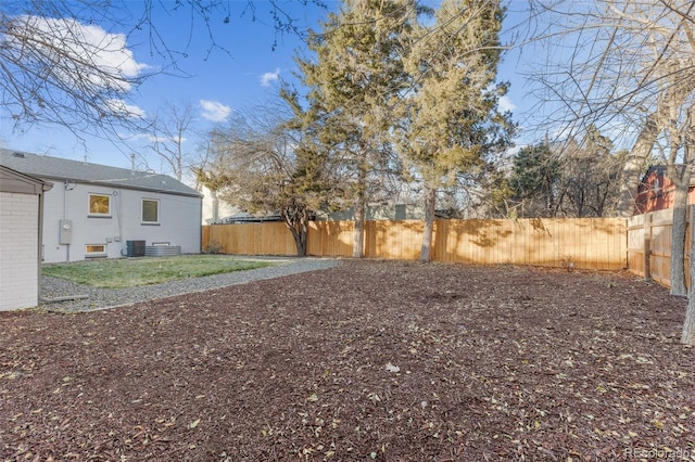 1220 Ash St, Denver, CO 80220 - view of yard with cooling unit and a fenced backyard