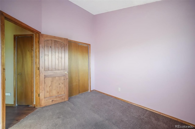 unfurnished bedroom featuring carpet