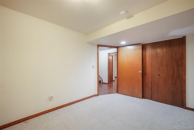 interior space featuring light colored carpet