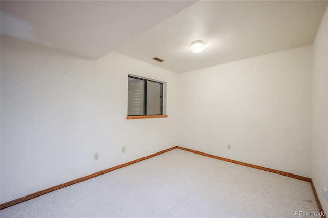 view of carpeted spare room