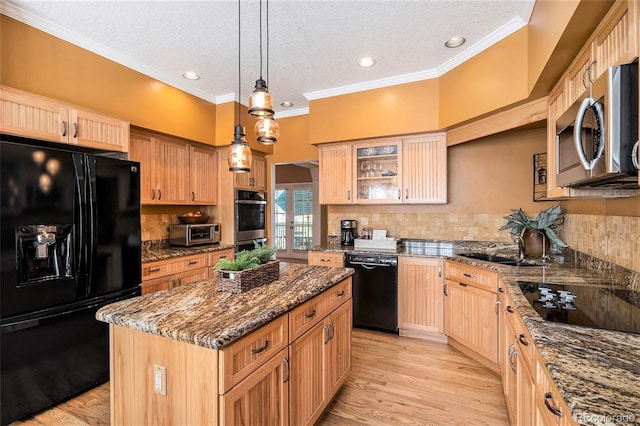 kitchen with black appliances, a center island, dark stone counters, tasteful backsplash, and glass insert cabinets