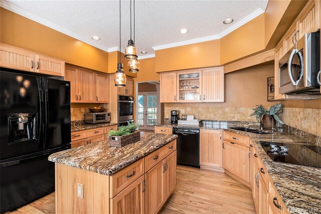 9875 Greensview Cir, Lone Tree, CO 80124 - kitchen featuring black appliances, a center island, dark stone countertops, tasteful backsplash, and glass insert cabinets