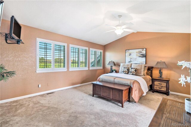 9875 Greensview Cir, Lone Tree, CO 80124 - bedroom with carpet floors, vaulted ceiling, baseboards, and a ceiling fan