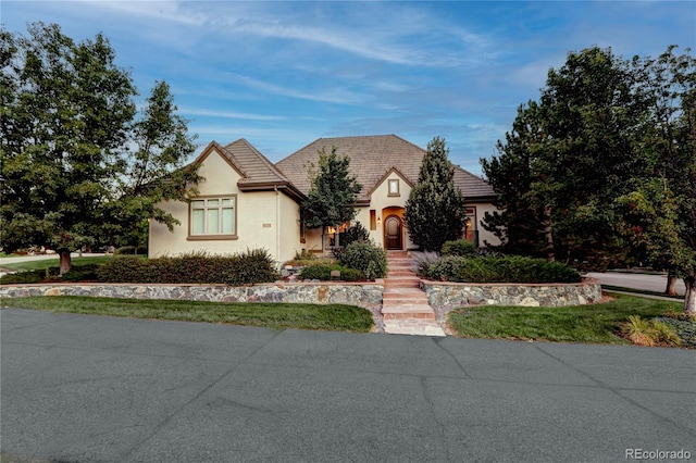 view of front of home featuring stucco siding