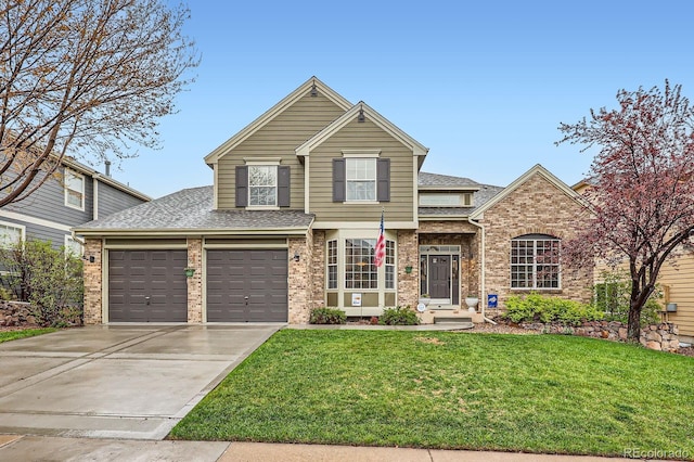 527 Stonemont Dr, Castle Pines, CO 80108 - traditional-style house with driveway, a front lawn, brick siding, and roof with shingles