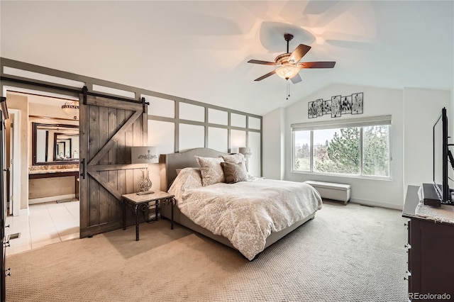 527 Stonemont Dr, Castle Pines, CO 80108 - bedroom with a barn door, vaulted ceiling, light colored carpet, baseboards, and ceiling fan