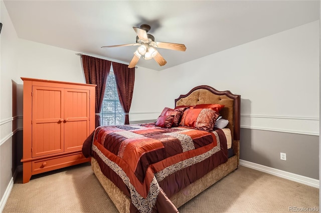 527 Stonemont Dr, Castle Pines, CO 80108 - bedroom with light colored carpet, baseboards, and ceiling fan