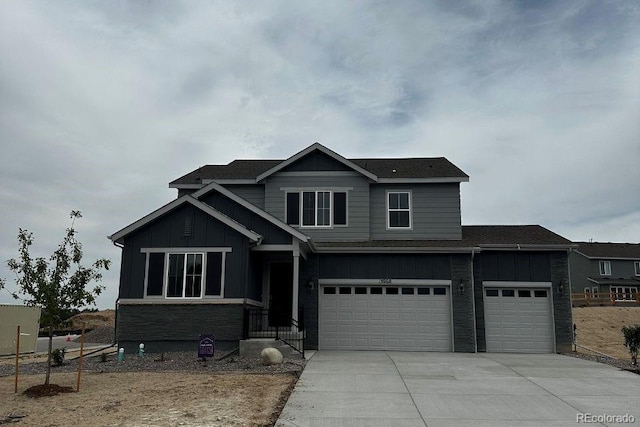 13960 Hanging Lake St, Parker, CO 80138 - view of front of property featuring board and batten siding, concrete driveway, and a garage