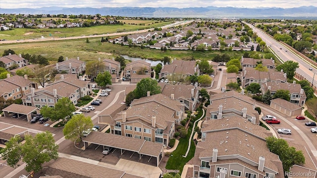 aerial perspective of suburban area featuring a mountainous background