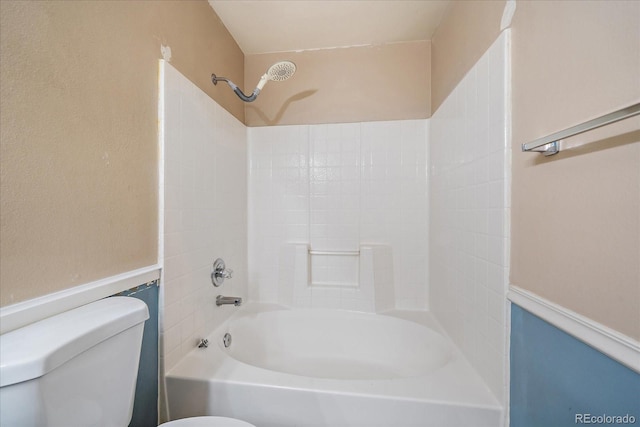 full bathroom featuring toilet and shower / washtub combination