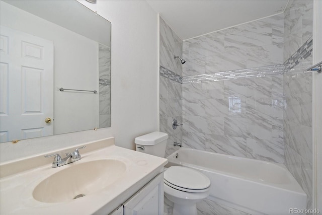 bathroom with toilet, vanity, and shower / tub combination