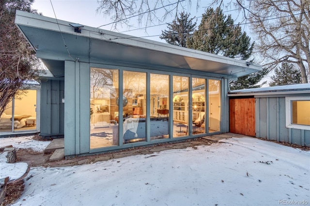 view of snow covered property