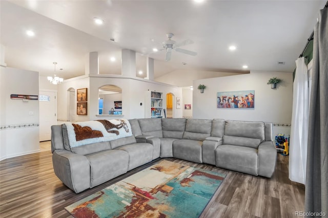 living area featuring lofted ceiling, recessed lighting, wood finished floors, and ceiling fan