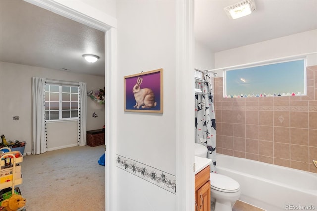 bathroom featuring toilet, vanity, and shower / bathtub combination with curtain