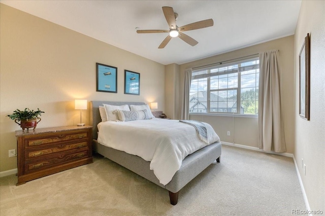 31112 Black Eagle Dr Unit 101, Evergreen, CO 80439 - bedroom with light carpet and a ceiling fan