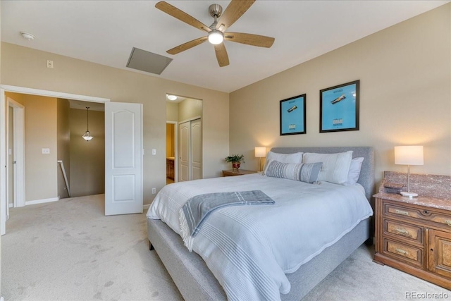31112 Black Eagle Dr Unit 101, Evergreen, CO 80439 - bedroom with light carpet, a closet, and ceiling fan