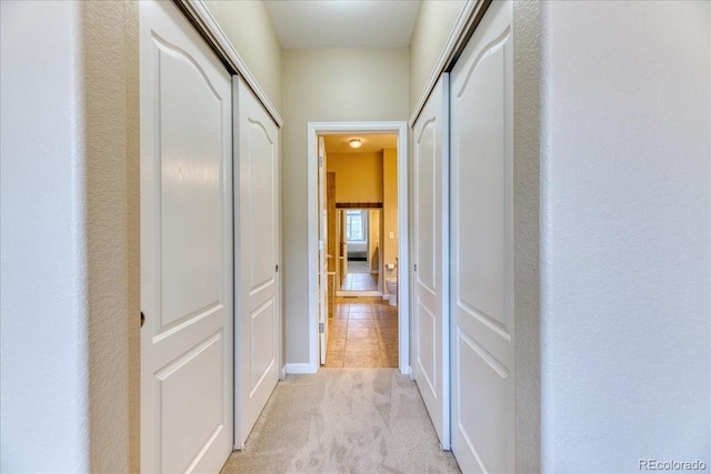 31112 Black Eagle Dr Unit 101, Evergreen, CO 80439 - corridor featuring light colored carpet