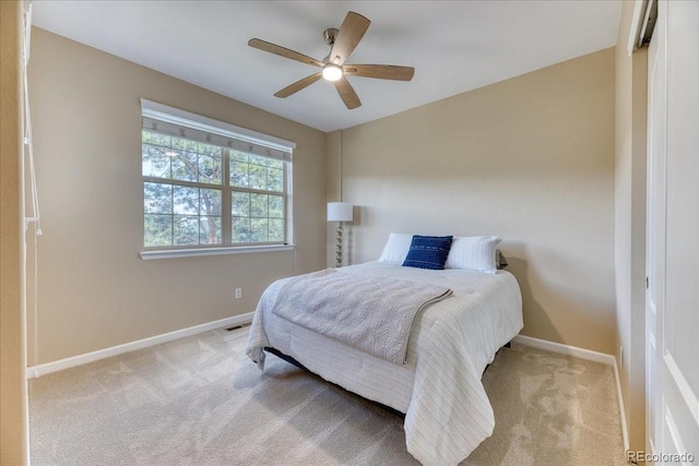 31112 Black Eagle Dr Unit 101, Evergreen, CO 80439 - carpeted bedroom with baseboards and ceiling fan