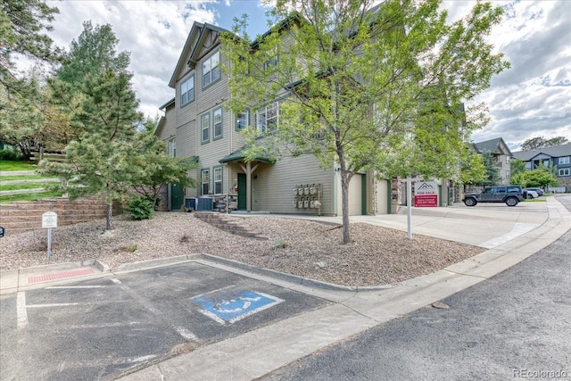 31112 Black Eagle Dr Unit 101, Evergreen, CO 80439 - view of front of house with uncovered parking