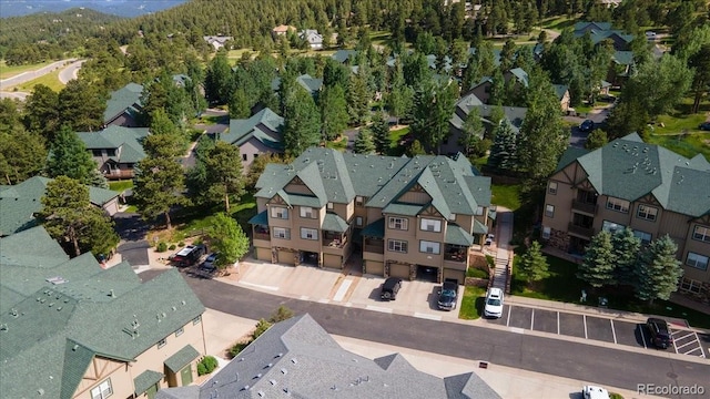 31112 Black Eagle Dr Unit 101, Evergreen, CO 80439 - aerial perspective of suburban area featuring a forest