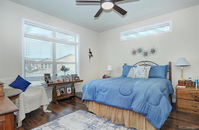 bedroom with a ceiling fan and wood finished floors