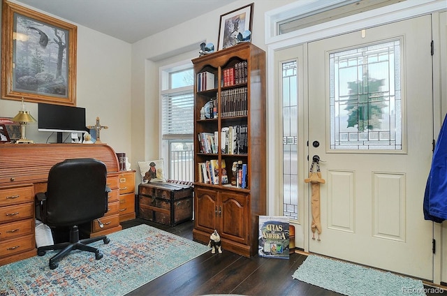 home office with dark wood-style floors